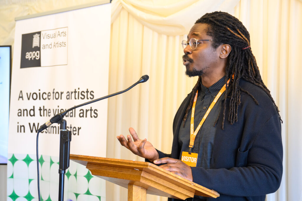 Artist Larry Achiampong pictured during the launch of ‘Framing the Future: The Case for Strengthening the Visual Arts Ecosystem’, at the House of Commons in London. HANDOUT PHOTO. FREE EDITORIAL USE. Photo credit: Matt Crossick/DACS. The report, by leading visual arts organisations, includes recommendations aimed at safeguarding the UK’s arts and artists ahead of the goverment’s spending review.